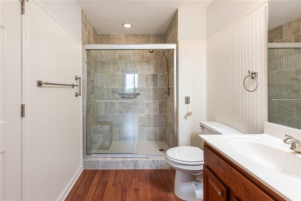 300 Johnson Ferry Road, Unit B808 Atlanta, GA 30328 - Photo 25 of 41 a bathroom with a sink a toilet and shower