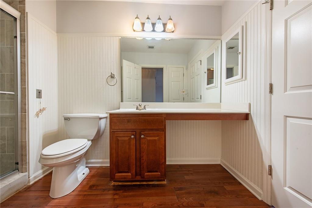 300 Johnson Ferry Road, Unit B808 Atlanta, GA 30328 - Photo 29 of 41 a bathroom with a sink and a mirror