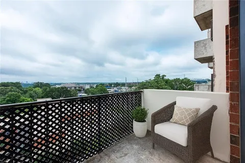 a view of a roof deck with couches