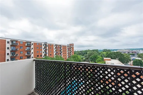 a view of city from a balcony
