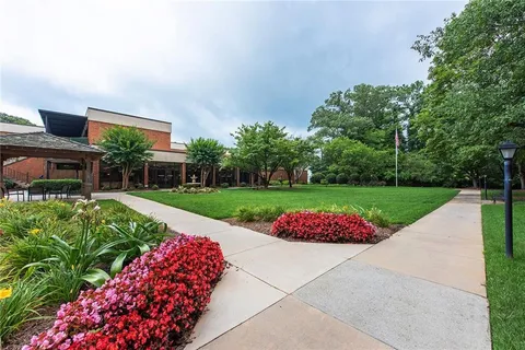 a view of a garden with an outdoor space