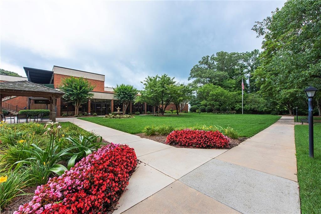 300 Johnson Ferry Road, Unit B808 Atlanta, GA 30328 - Photo 40 of 41 a view of a garden with an outdoor space