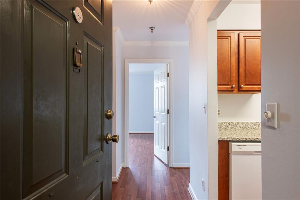 300 Johnson Ferry Road, Unit B808 Atlanta, GA 30328 - Photo 6 of 41 a view of hallway with wooden floor