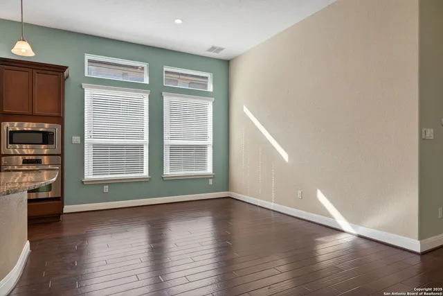 a view of livingroom with hardwood floor and window