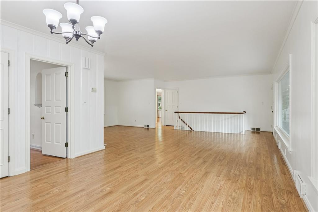 806 Belmont Road Butler, PA 16001 - Photo 14 of 49 a view of a room with wooden floor and a ceiling fan