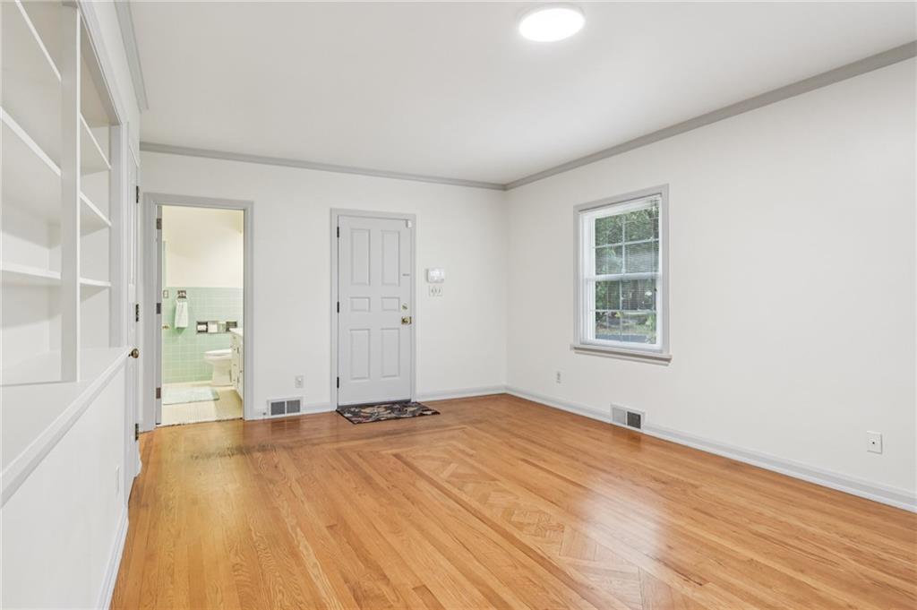 806 Belmont Road Butler, PA 16001 - Photo 23 of 49 a view of a room with wooden floor and windows