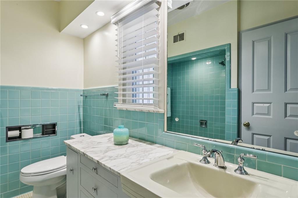 806 Belmont Road Butler, PA 16001 - Photo 24 of 49 a bathroom with a granite countertop sink a toilet a mirror and bathtub