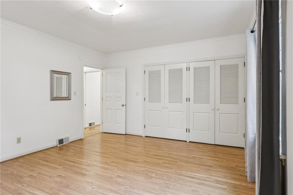 806 Belmont Road Butler, PA 16001 - Photo 27 of 49 a view of an empty room with wooden floor