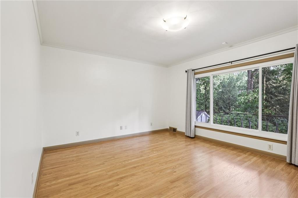 806 Belmont Road Butler, PA 16001 - Photo 30 of 49 an empty room with wooden floor and windows