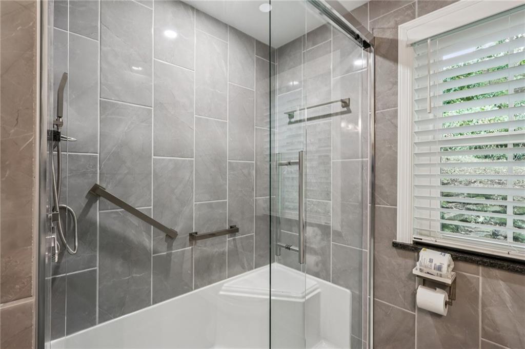 806 Belmont Road Butler, PA 16001 - Photo 35 of 49 a bathroom with a shower and a sink