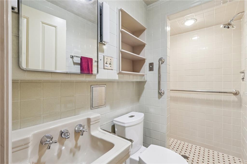 806 Belmont Road Butler, PA 16001 - Photo 40 of 49 a bathroom with a sink toilet and shower