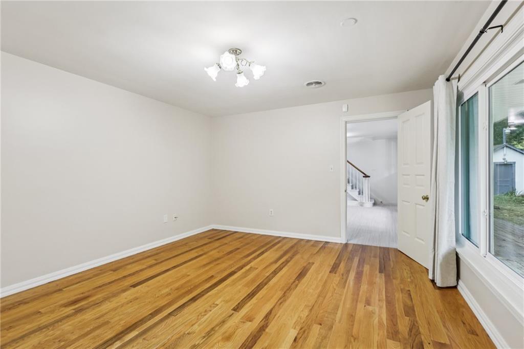 806 Belmont Road Butler, PA 16001 - Photo 41 of 49 a view of empty room with wooden floor and fan