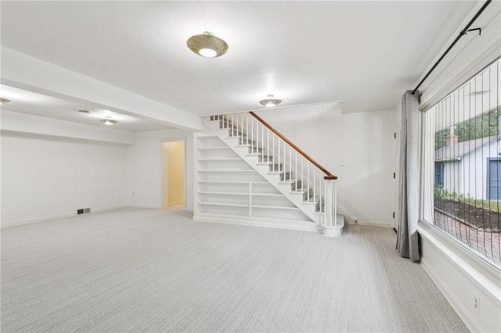 806 Belmont Road Butler, PA 16001 - Photo 42 of 49 a view of an empty room with stairs