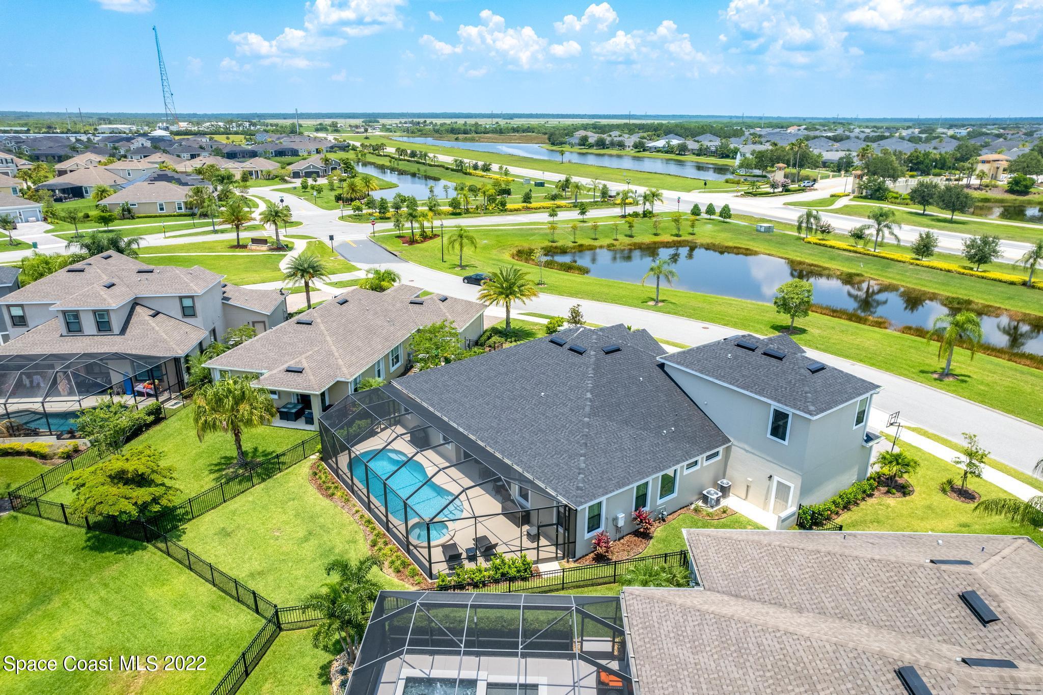 3231 Casterton Drive Melbourne, FL 32940 - Photo 78 of 88 an aerial view of residential houses with outdoor space and ocean view