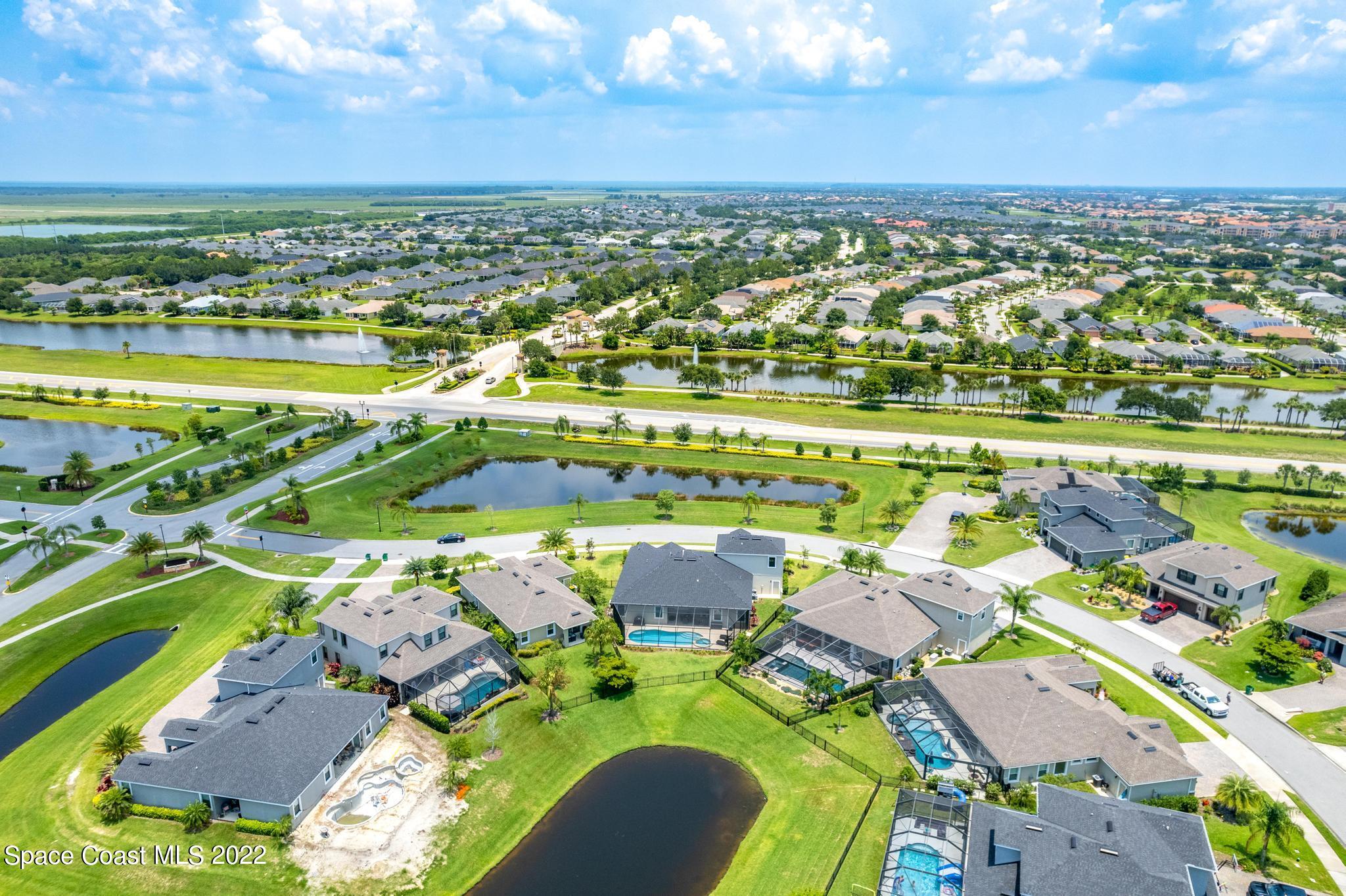 3231 Casterton Drive Melbourne, FL 32940 - Photo 82 of 88 an aerial view of residential houses with outdoor space