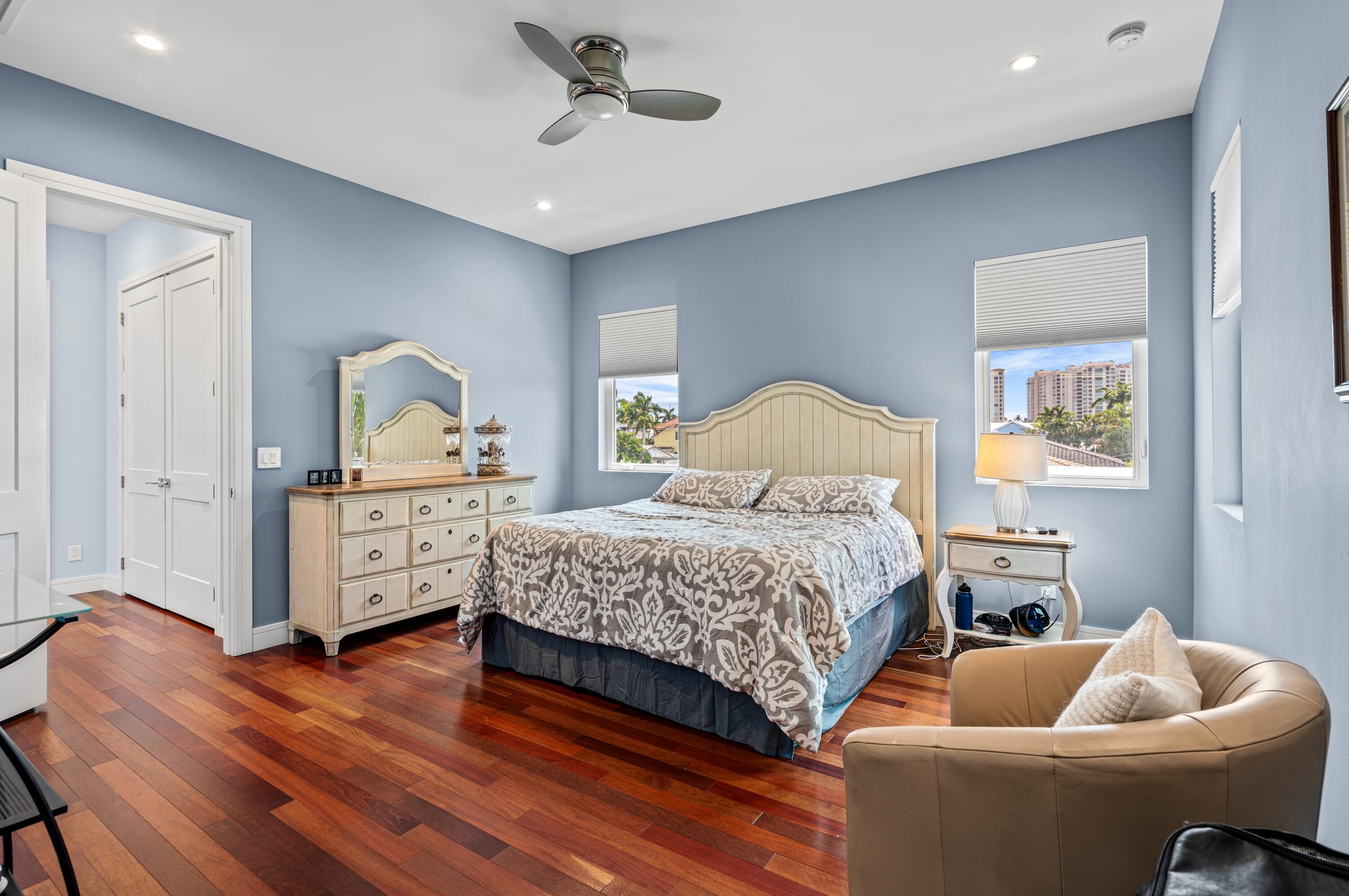 807 Dover Street Boca Raton, FL 33487 - Photo 22 of 47 a bedroom with a bed and wooden floor