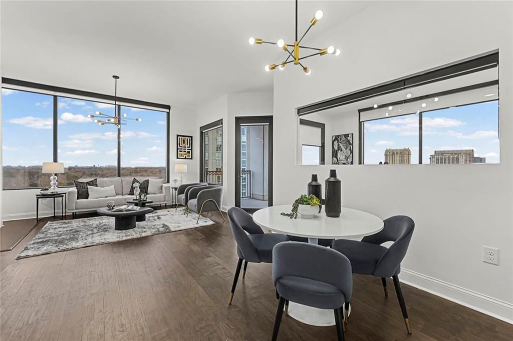 2828 Peachtree Road Northwest, Unit 1704 Atlanta, GA 30305 - Photo 13 of 41 a view of a dining room with furniture window and outside view