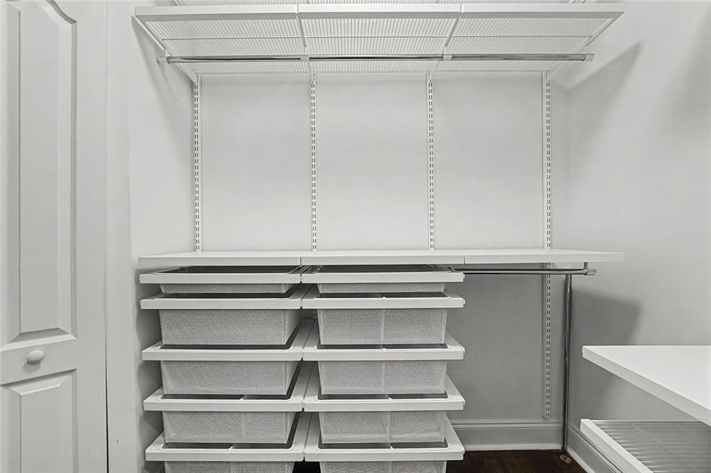 2828 Peachtree Road Northwest, Unit 1704 Atlanta, GA 30305 - Photo 25 of 41 a view of room with cabinets and racks