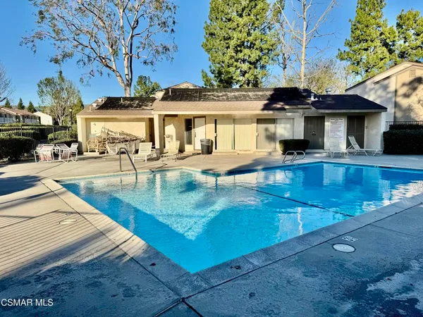 a view of a house with swimming pool