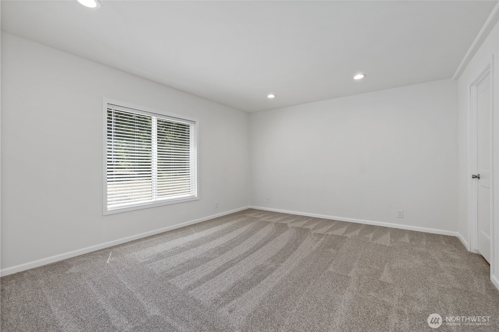 17217 80th Street Southwest Longbranch, WA 98351 - Photo 24 of 39 an empty room with a window