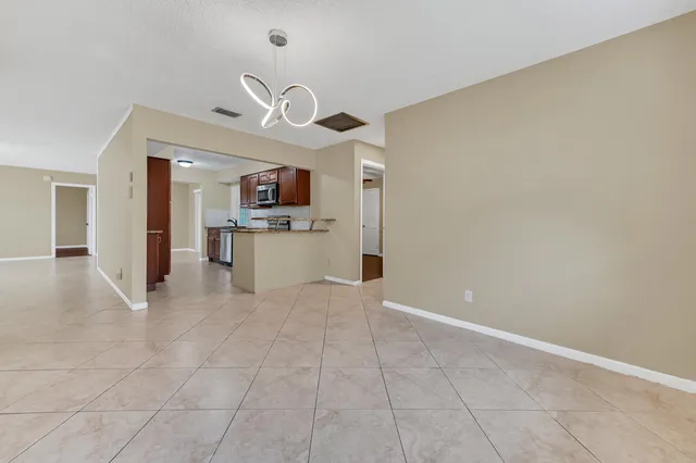 $499,500 | 5001 Woodstone Circle West, Lake Worth, FL 33463