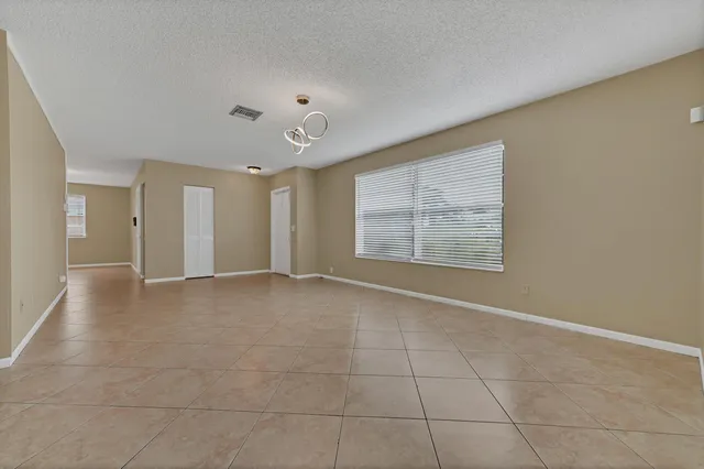 $499,500 | 5001 Woodstone Circle West, Lake Worth, FL 33463