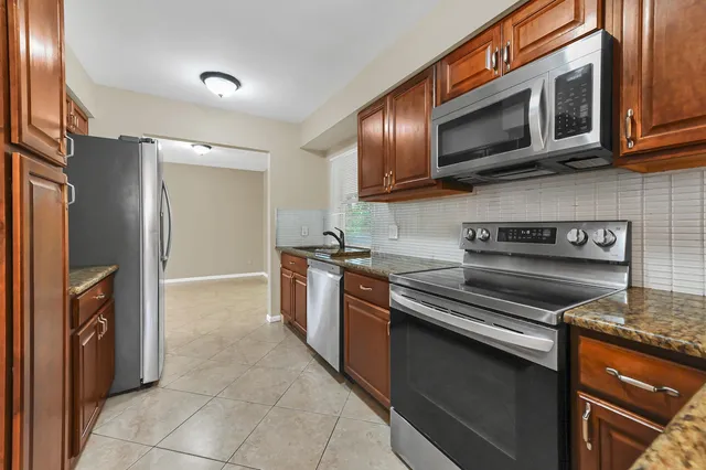 $499,500 | 5001 Woodstone Circle West, Lake Worth, FL 33463