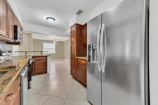 $499,500 | 5001 Woodstone Circle West, Lake Worth, FL 33463