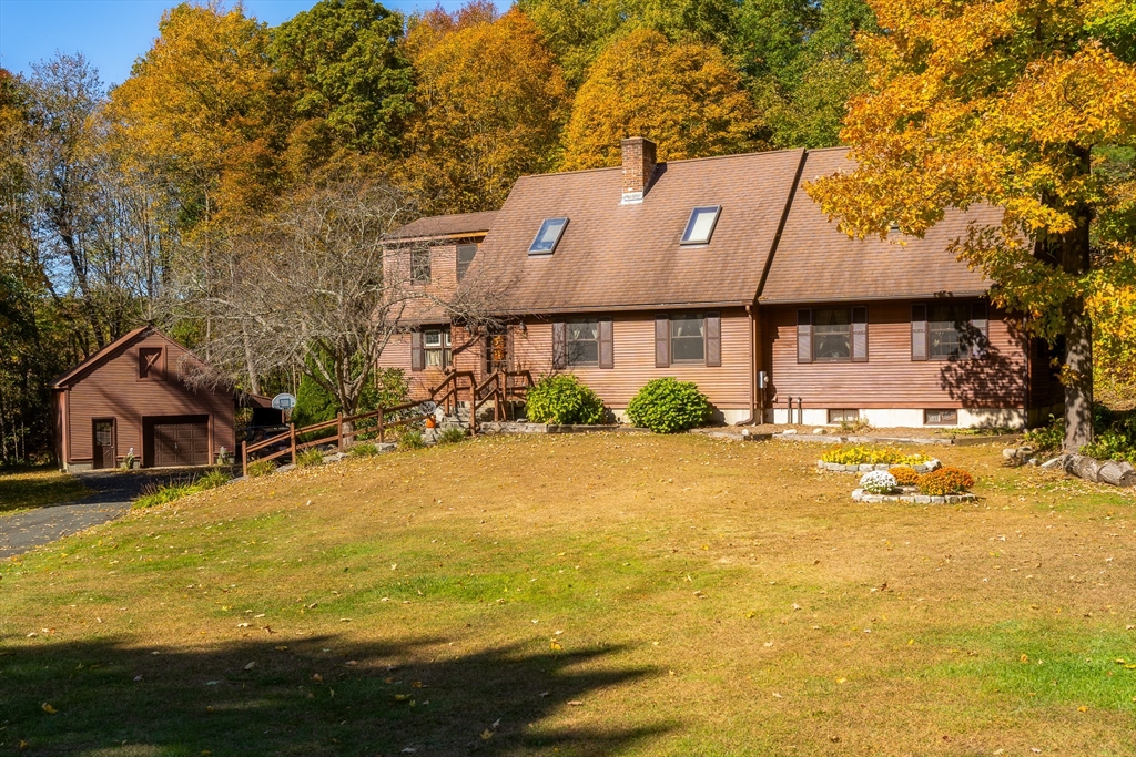 a front view of house with yard