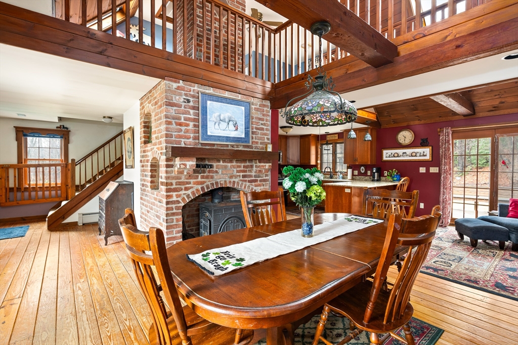 168 Brickyard Road Southampton, MA 01073 - Photo 17 of 42 a view of a dining room with furniture window and wooden floor