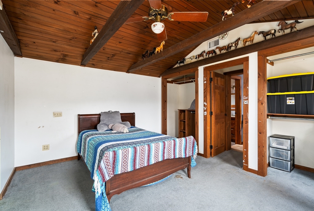 168 Brickyard Road Southampton, MA 01073 - Photo 35 of 42 a bedroom with a bed and a walk in closet