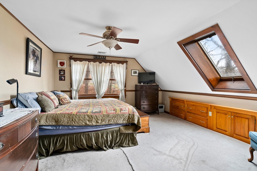 168 Brickyard Road Southampton, MA 01073 - Photo 37 of 42 a spacious bedroom with a bed and a dresser