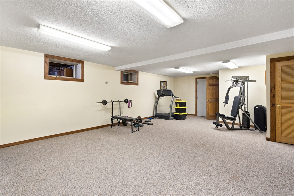 168 Brickyard Road Southampton, MA 01073 - Photo 42 of 42 a view of a room with gym equipment