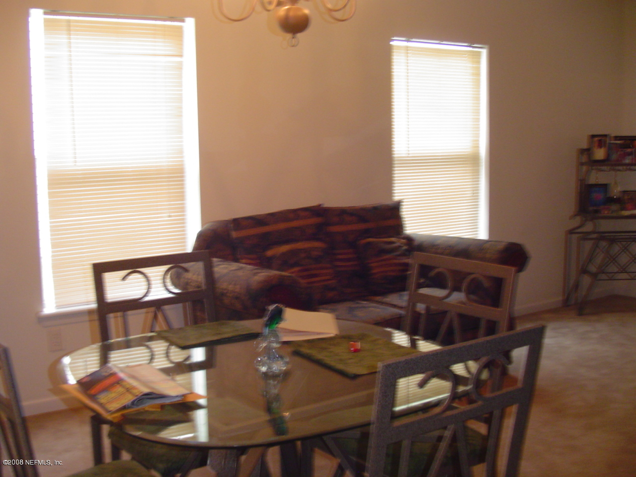 7260 Rampart Ridge Circle West Jacksonville, FL 32244 - Photo 4 of 16 a view of a dining room with furniture and window
