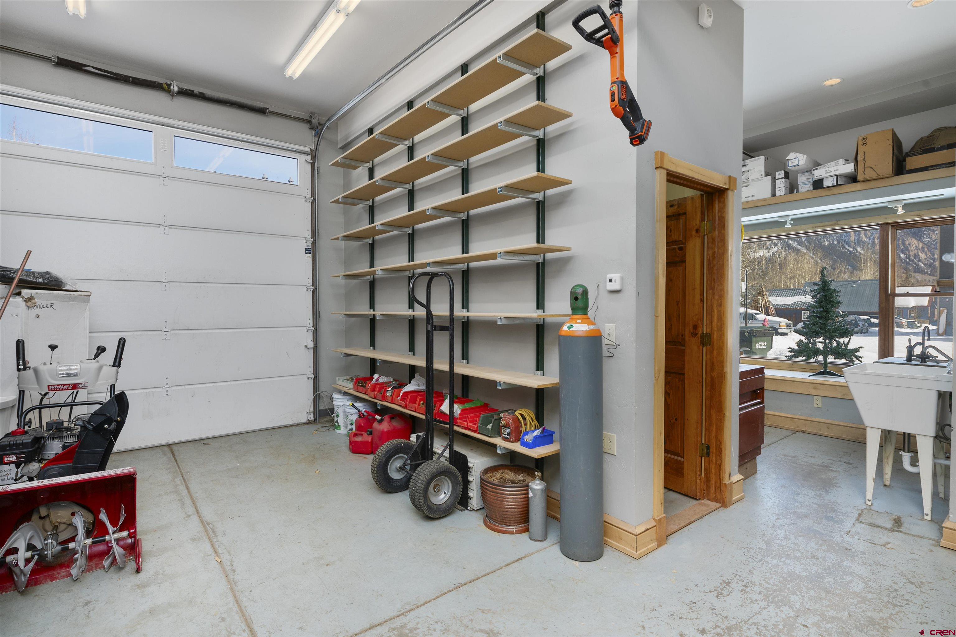 611 3rd Street, Unit A & B Crested Butte, CO 81224 - Photo 13 of 34 a view of a room with shelves