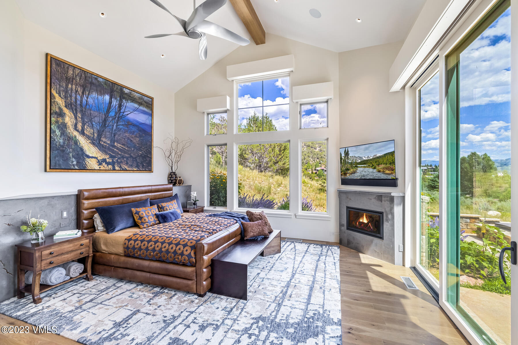 81 Elk Run Edwards, CO 81632 - Photo 25 of 62 a bedroom with a bed and wooden floor