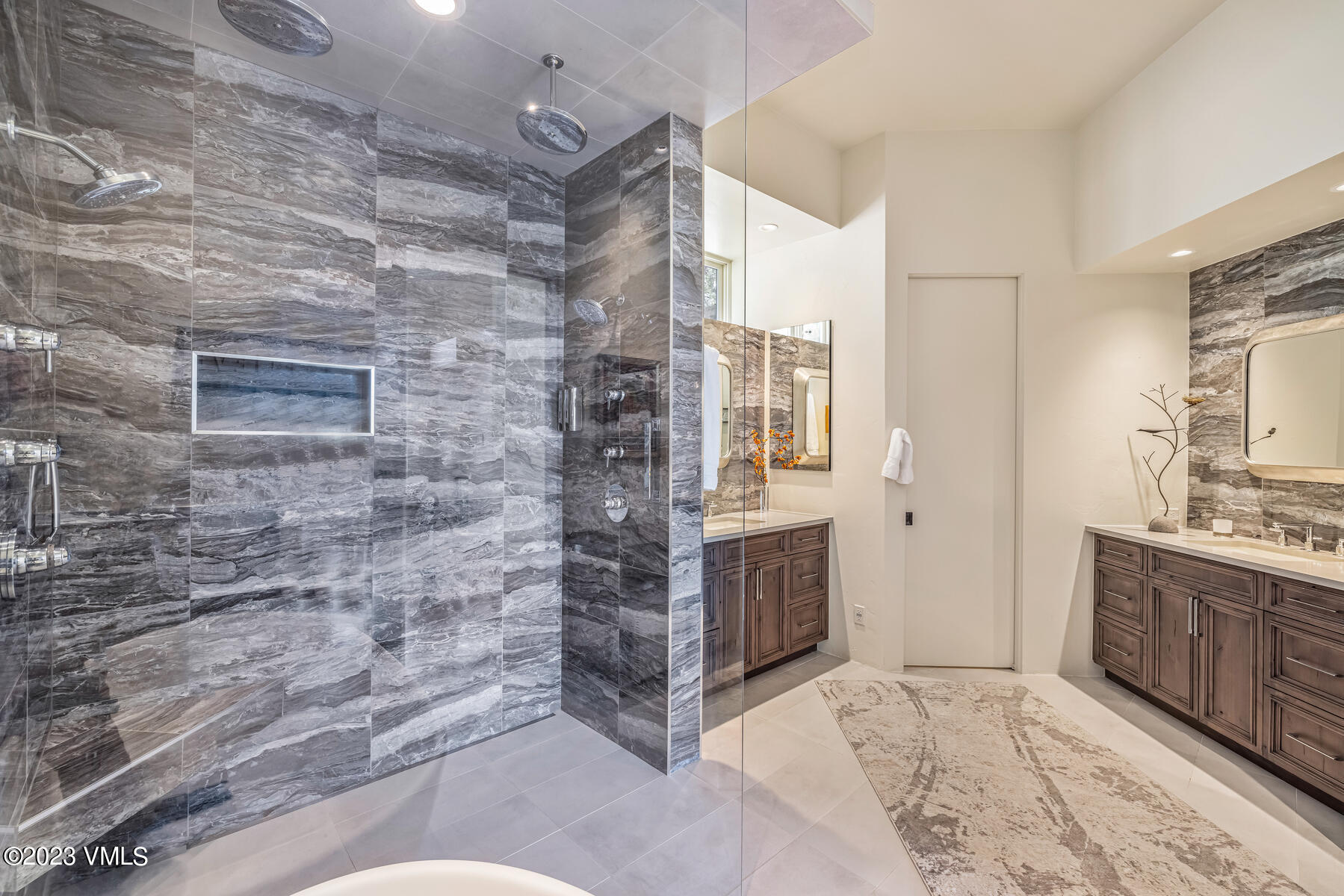 81 Elk Run Edwards, CO 81632 - Photo 29 of 62 a bathroom with a sink and a mirror