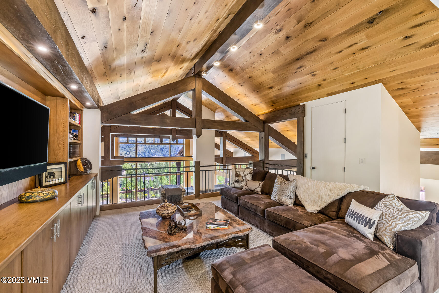 81 Elk Run Edwards, CO 81632 - Photo 31 of 62 a living room with furniture and a flat screen tv