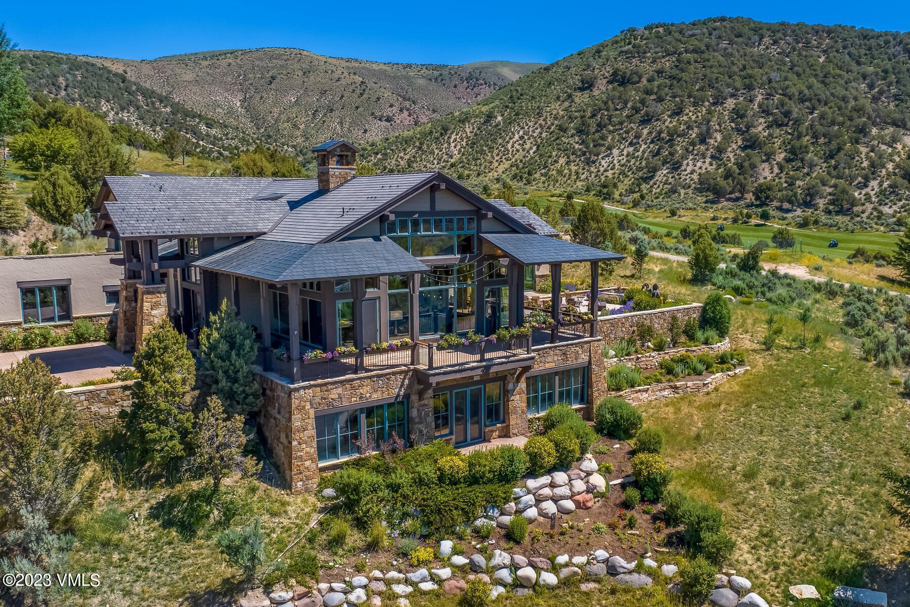 81 Elk Run Edwards, CO 81632 - Photo 4 of 62 a house with green field in front of it