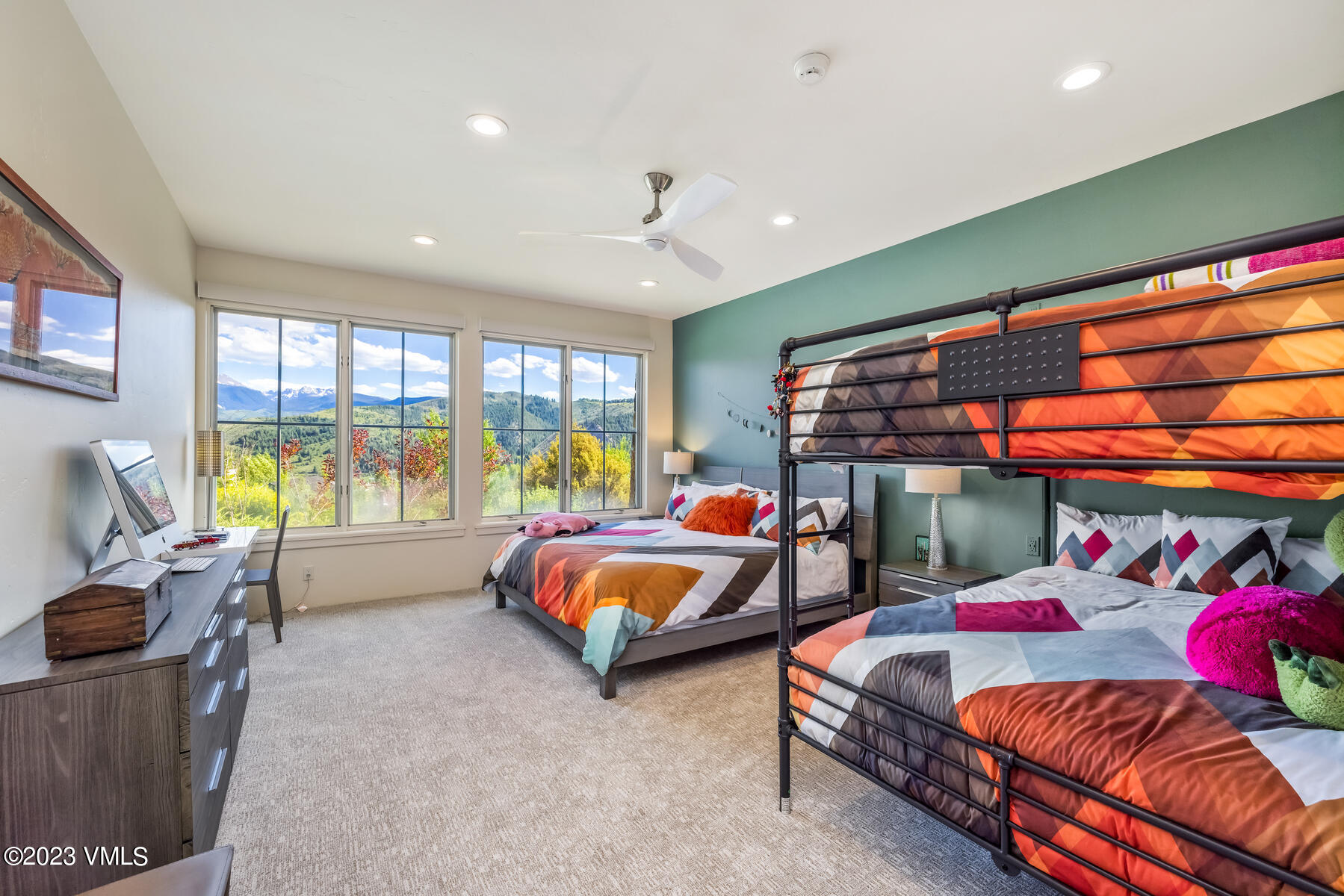 81 Elk Run Edwards, CO 81632 - Photo 44 of 62 a bedroom with two beds and a large window