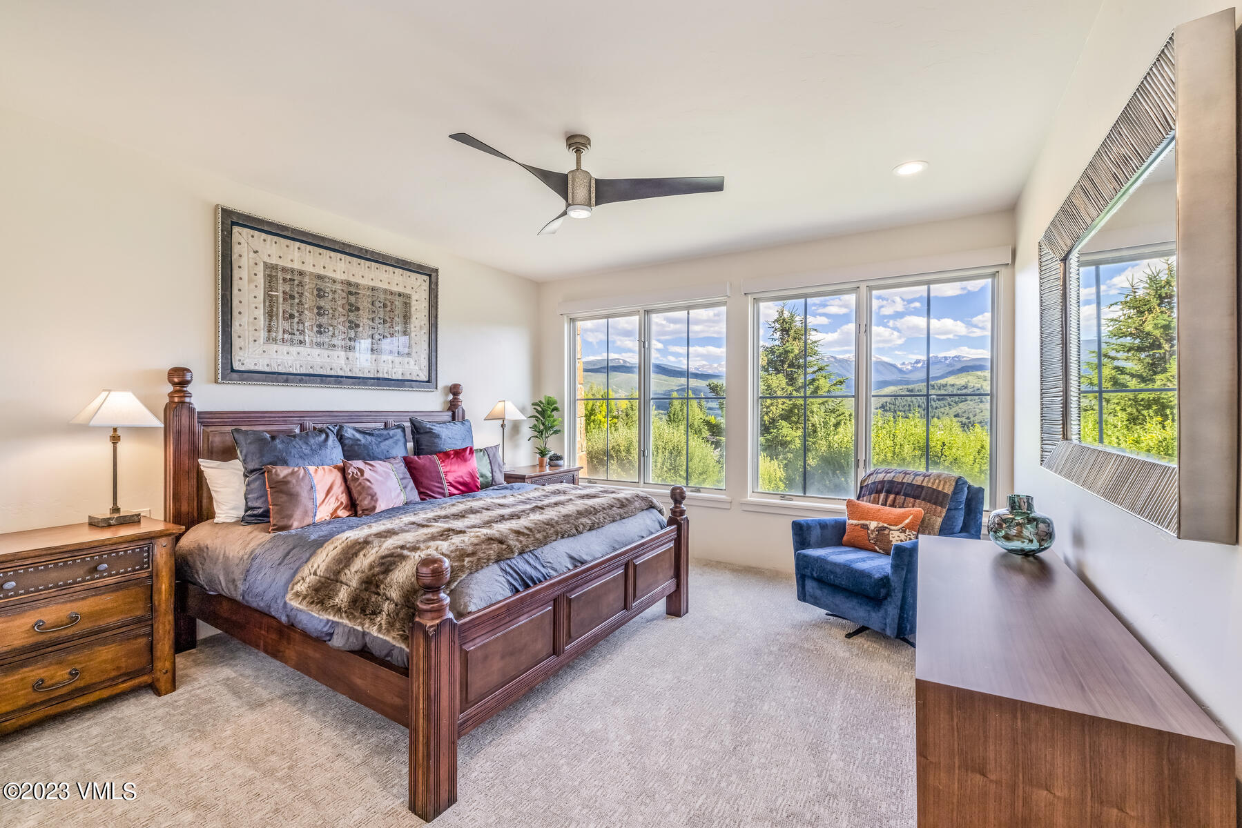 81 Elk Run Edwards, CO 81632 - Photo 48 of 62 a bedroom with a bed couch and a large window
