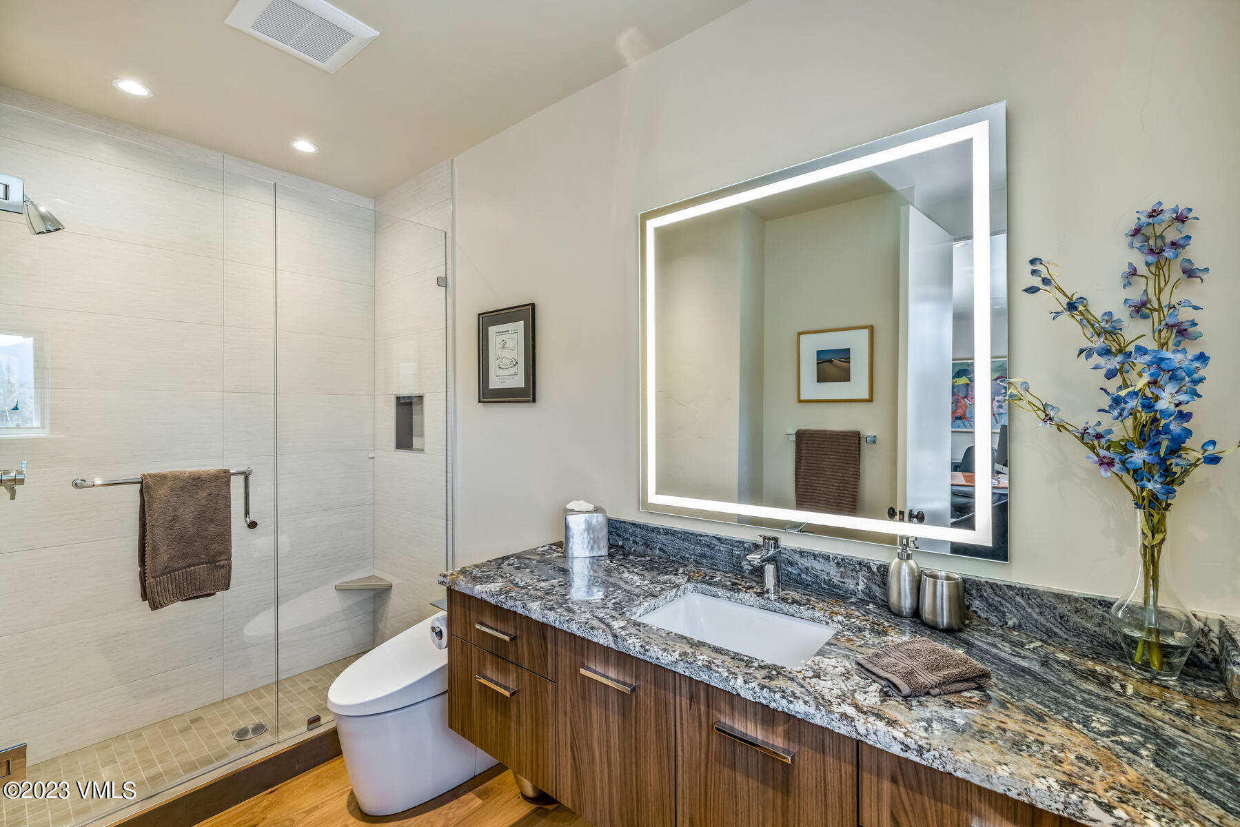 81 Elk Run Edwards, CO 81632 - Photo 49 of 62 a bathroom with a granite countertop sink and a mirror