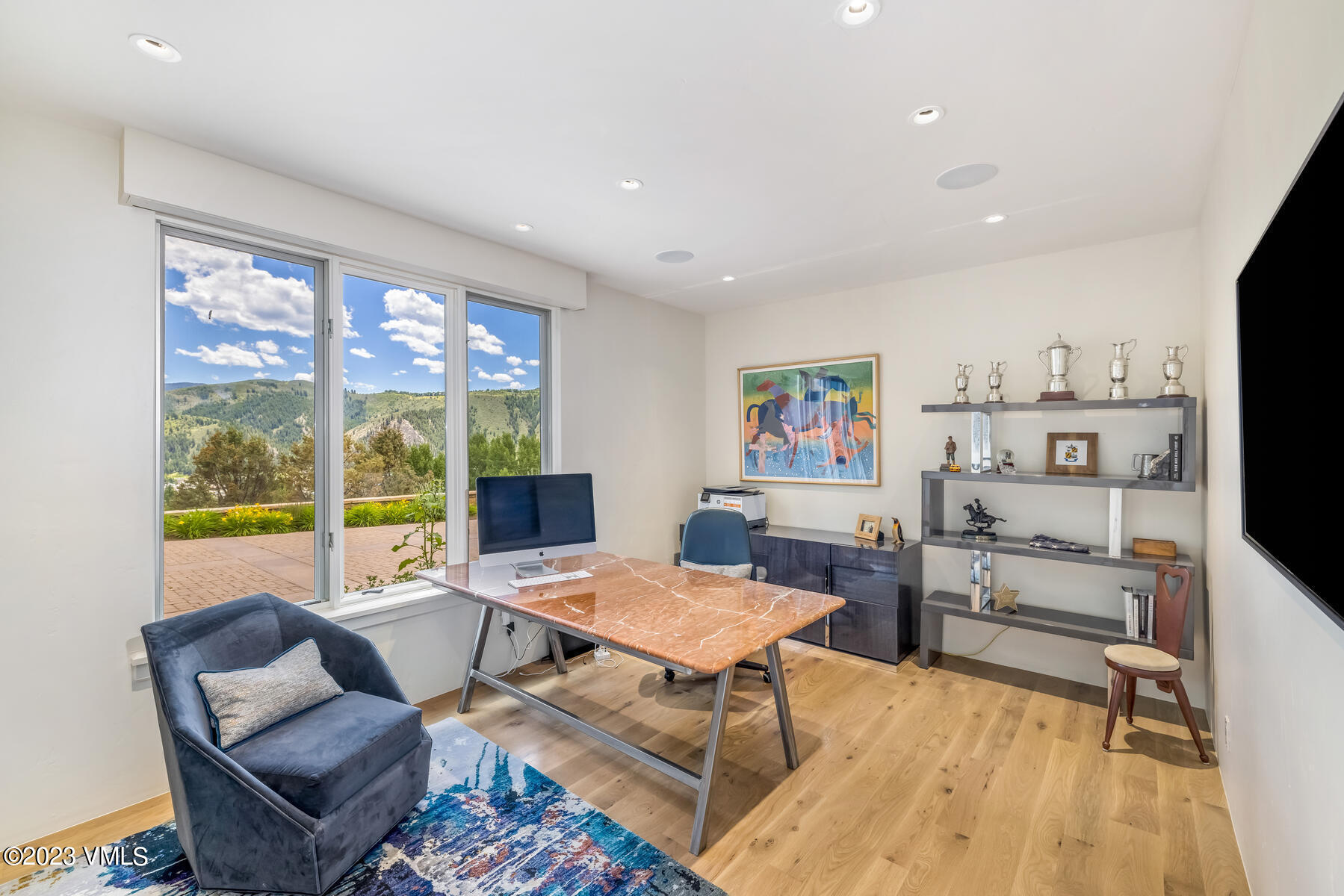 81 Elk Run Edwards, CO 81632 - Photo 50 of 62 a workspace with furniture and a flat screen tv