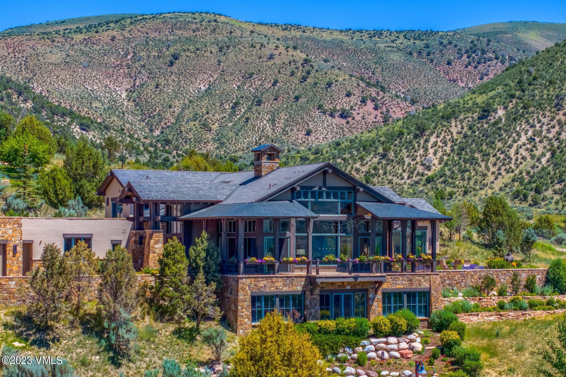 81 Elk Run Edwards, CO 81632 - Photo 57 of 62 a front view of a house with a garden