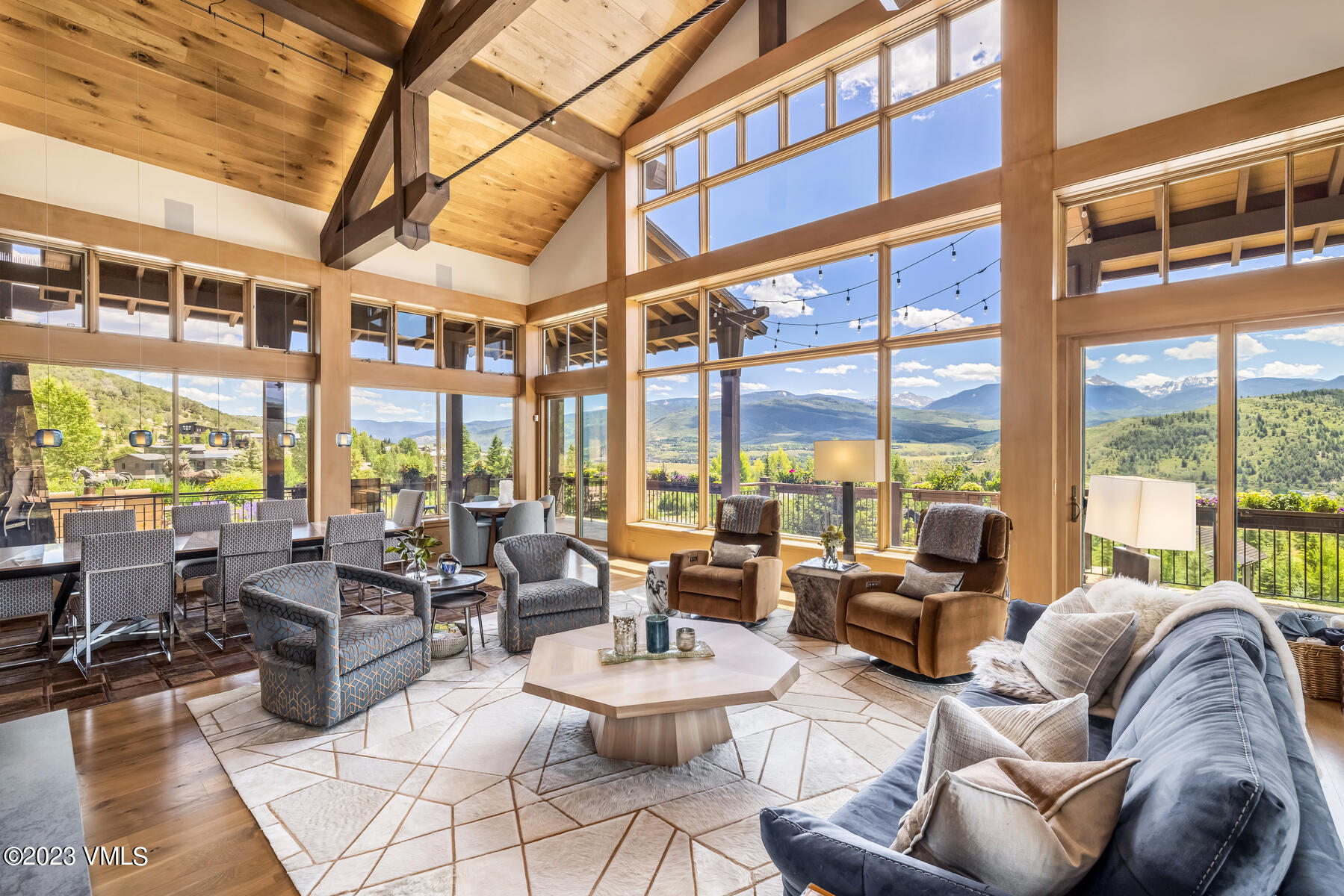 81 Elk Run Edwards, CO 81632 - Photo 7 of 62 a living room with furniture and floor to ceiling windows