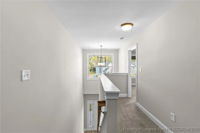 a view of hallway with stairs