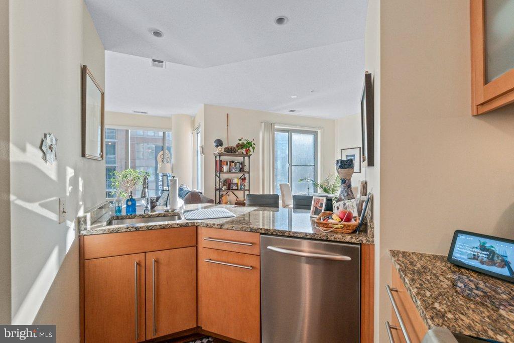 675 President Street, Unit 1404 Baltimore, MD 21202 - Photo 26 of 31 a kitchen with sink and refrigerator