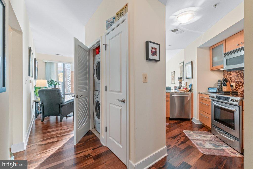 675 President Street, Unit 1404 Baltimore, MD 21202 - Photo 9 of 31 a view of a kitchen and utility room