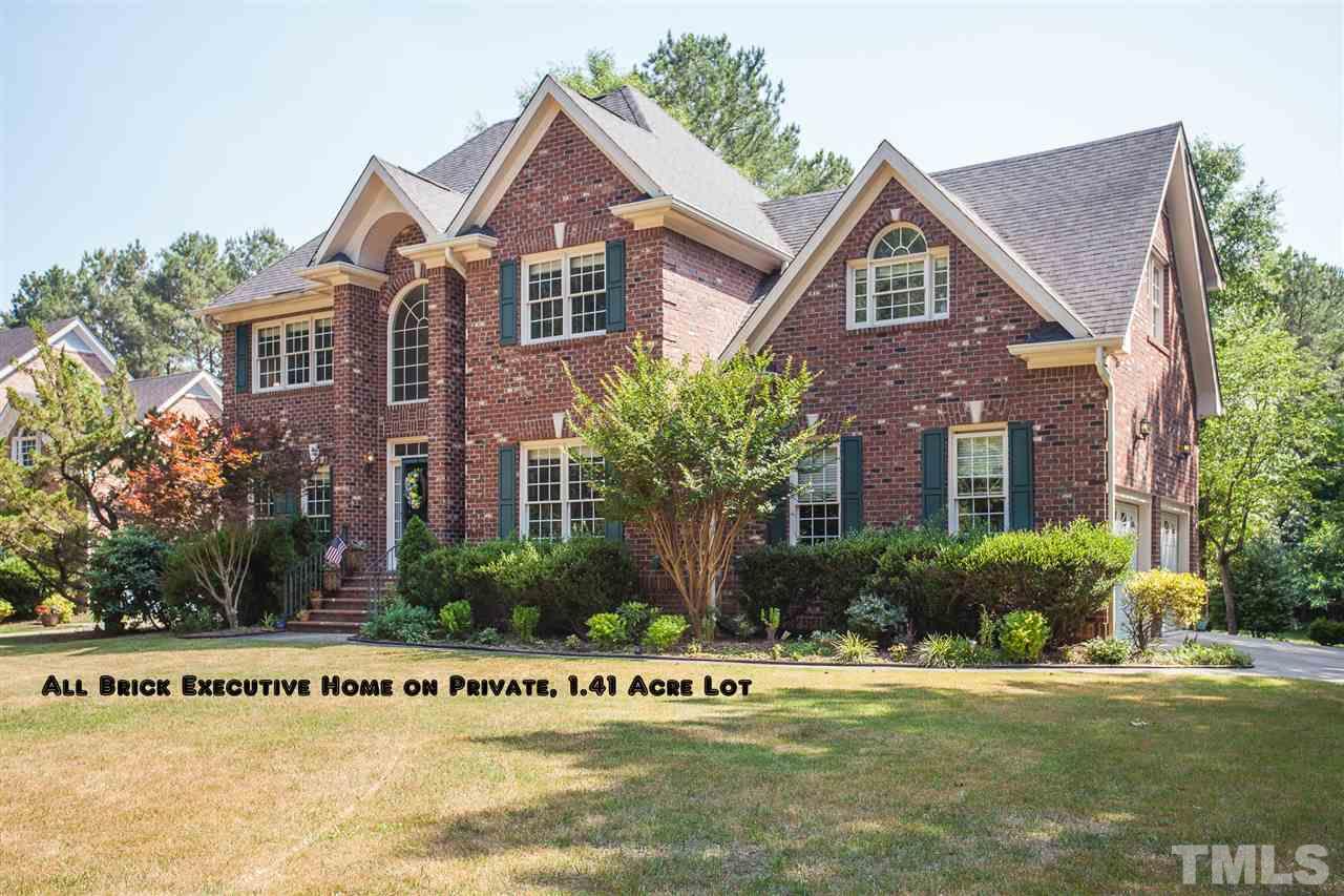 2613 Lizei Street Raleigh, NC 27616 - Photo 1 of 25 a front view of a house with a garden