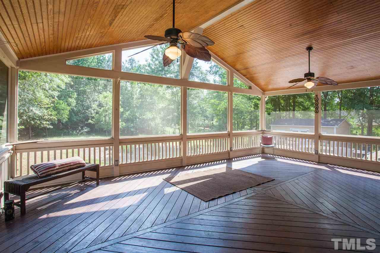 2613 Lizei Street Raleigh, NC 27616 - Photo 2 of 25 a view of porch with wooden floor
